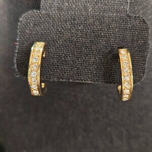 Gold tone earrings with rhinestones